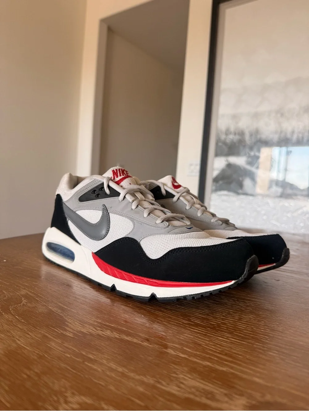 Nike Men’s White, Black and Gray Sneakers with Red Accents